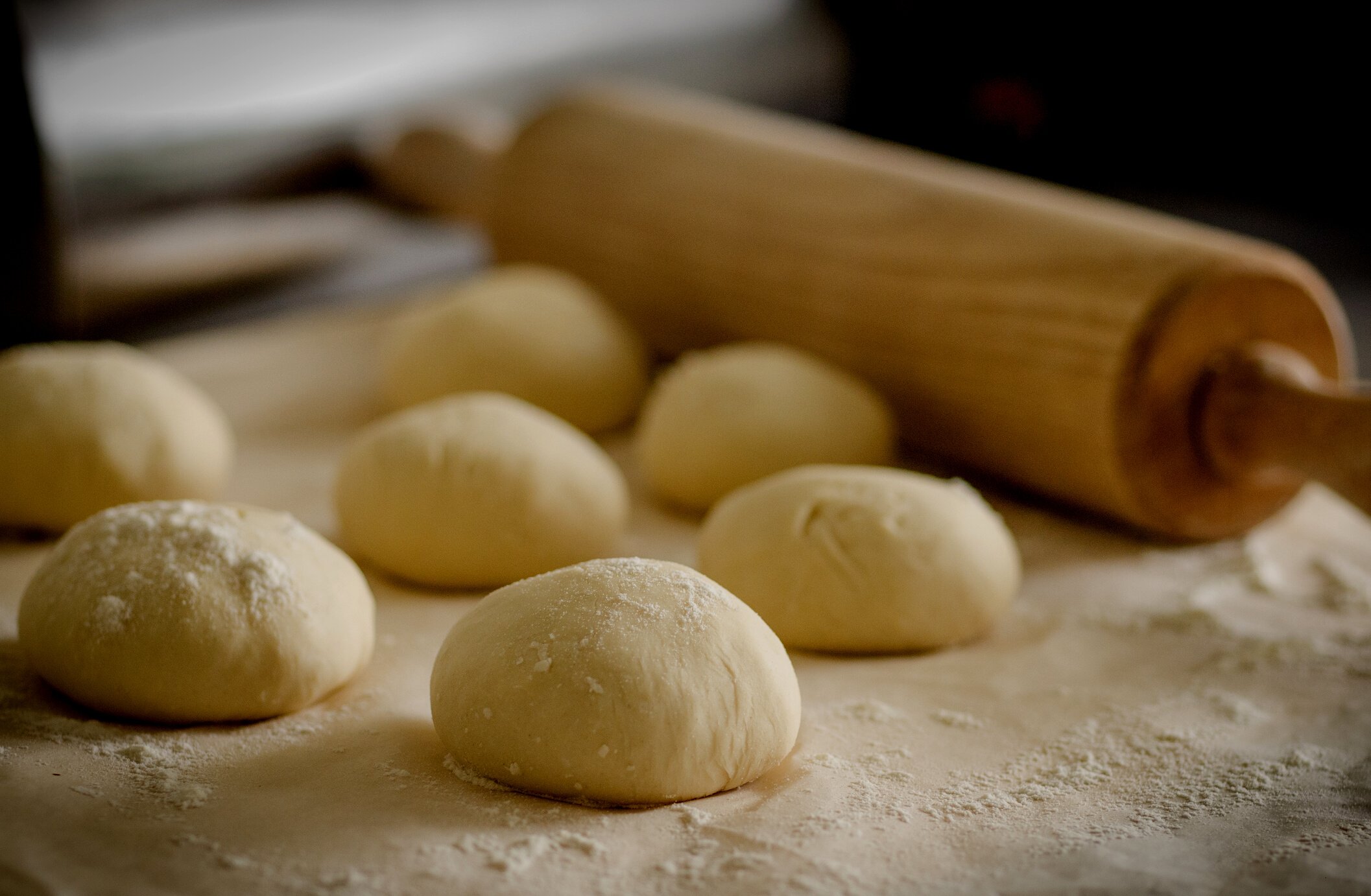 Wheat Beside Brown Wooden Rolling Pin